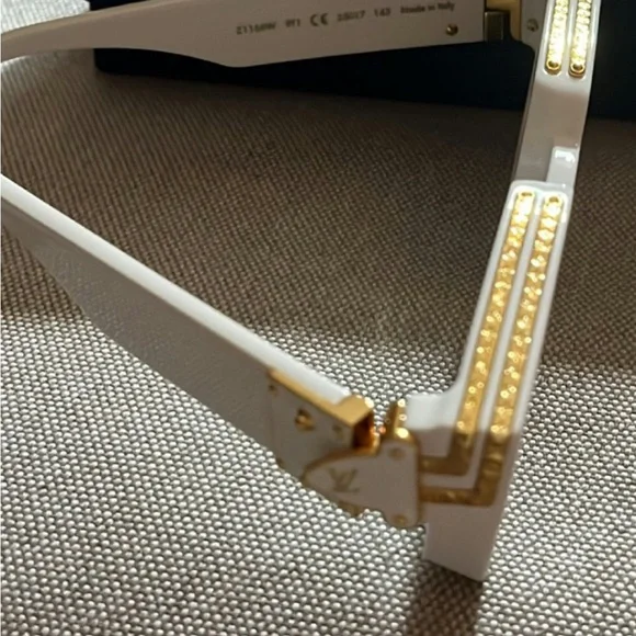 Louis Vuitton 1.1 Millionaires Sunglasses

$895.00 + tax unisex, good condition - Picture 5 of 6